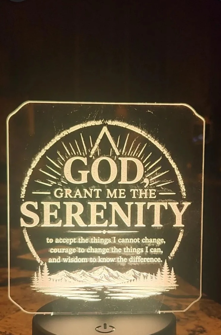 Serenity Prayer LED desktop sign with laser engraved acrylic panel glowing on a light base
